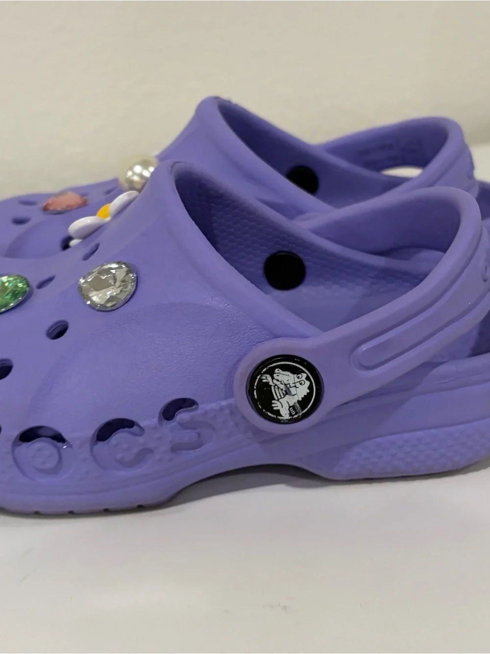 Girls size 9 toddler. Purple CROCS  Great Condition! Charms included
